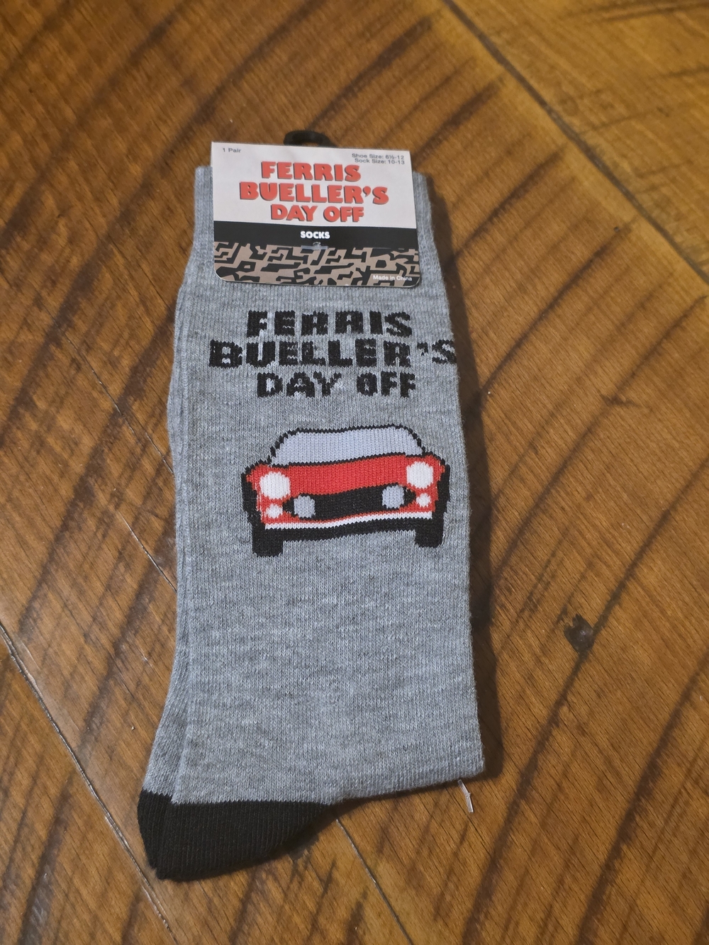 Ferris Bueller's Day Off Gray Novelty Socks with Red Car Design